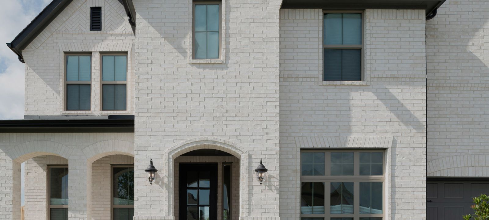 white brick home