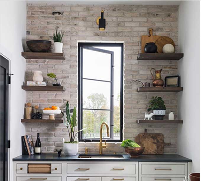 thin brick backsplash over a kitchen sink