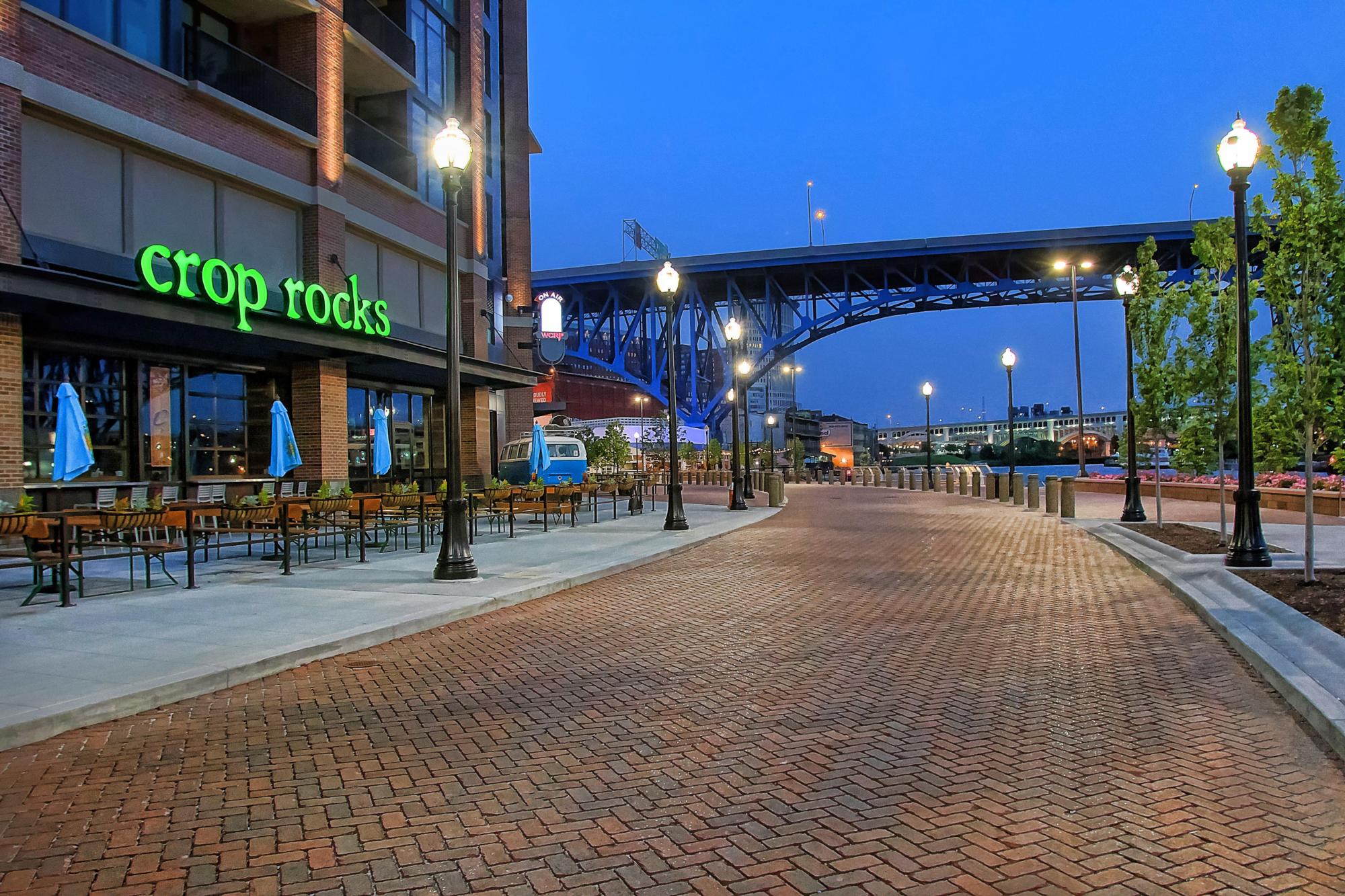 Image of a bricked city street at dusk