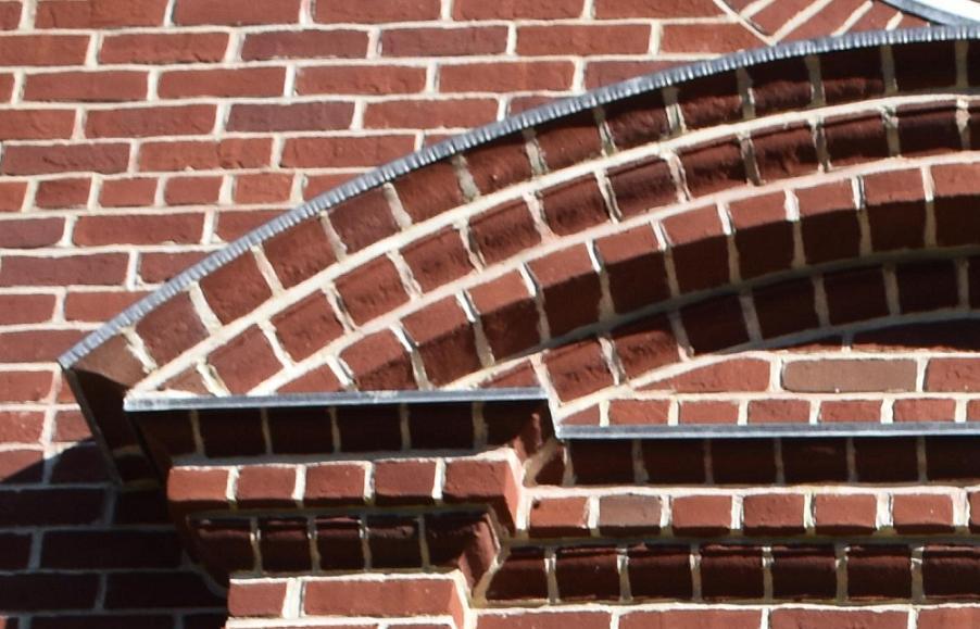 Close photo of a brick archway