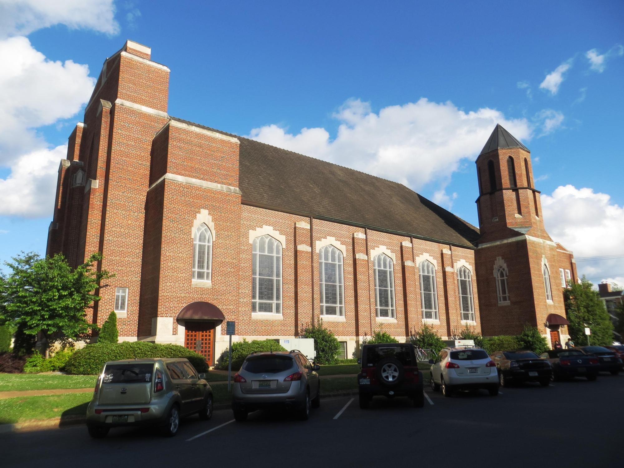 Exterior image of The Retail Center on Bryant Drive showcasing red brick and brick walkways