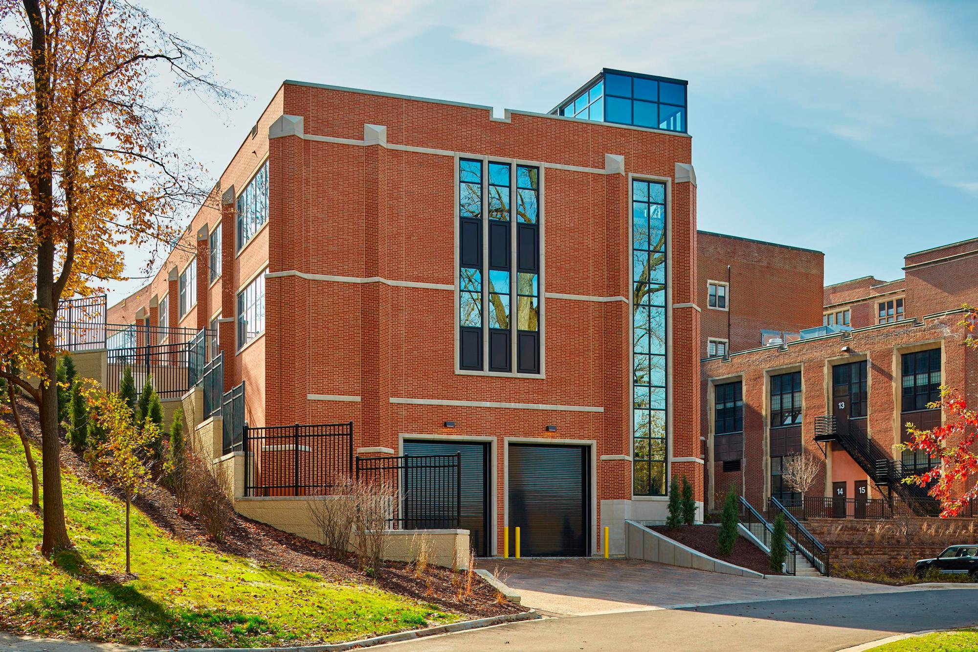 Image of the red bricked exterior of the Glenbard West High School Expansion