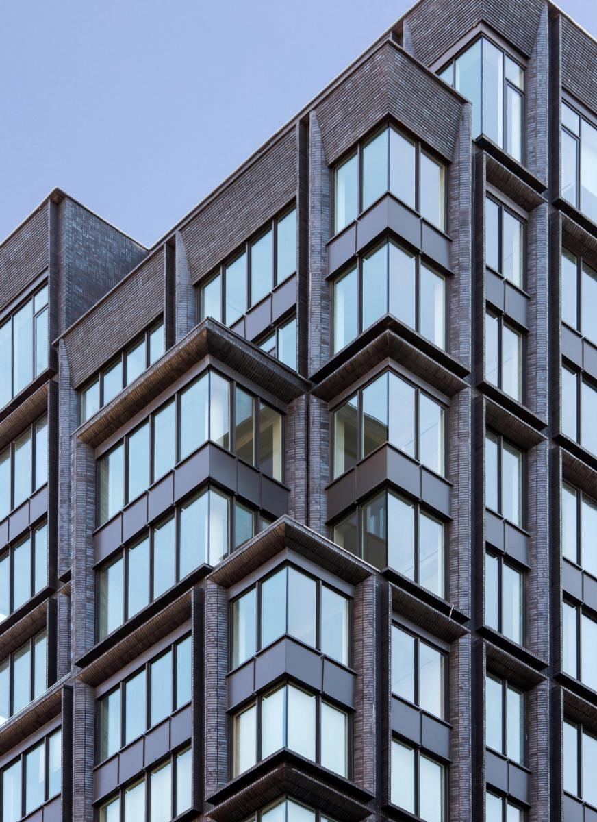 Image of the multi-family residence 5 Franklin Place, showcasing brickwork and windows