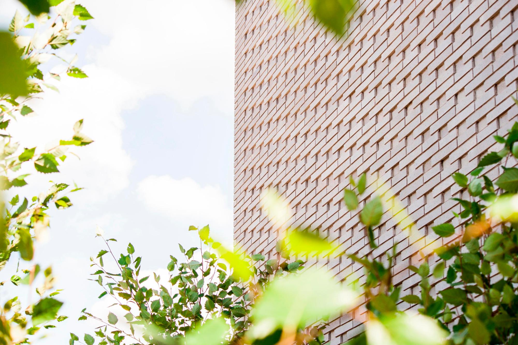 Image of the bricked exterior of the 613 Baltic Street apartment complex