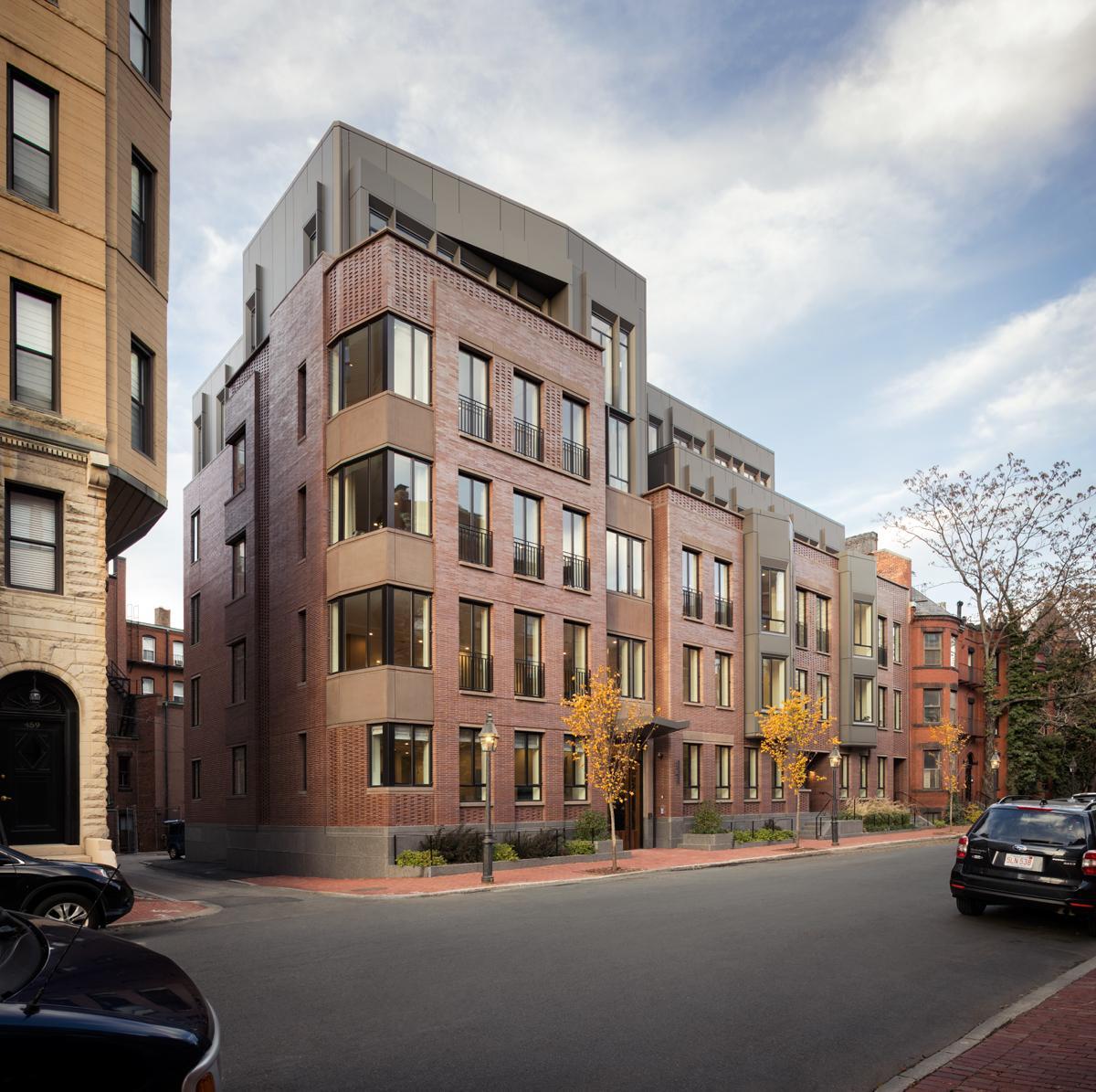 Image of the bricked exterior of the Four51 Marlborough multi-family housing complex