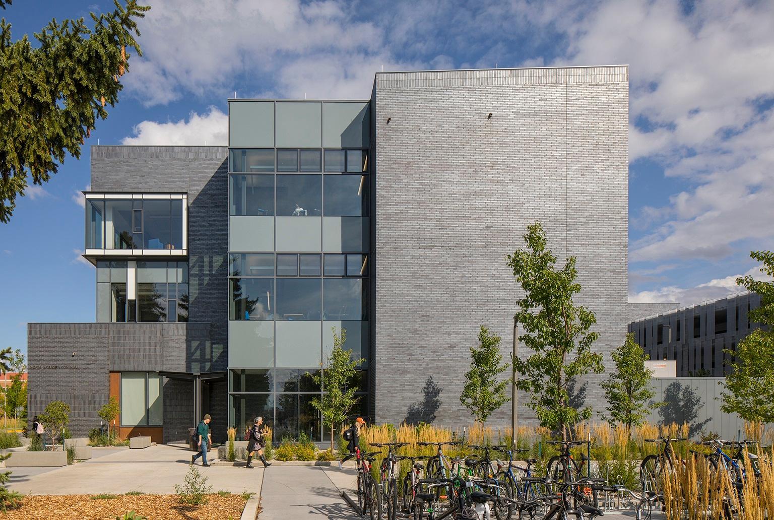 Image of the gray bricked exterior of Norm Asbjornson Hall