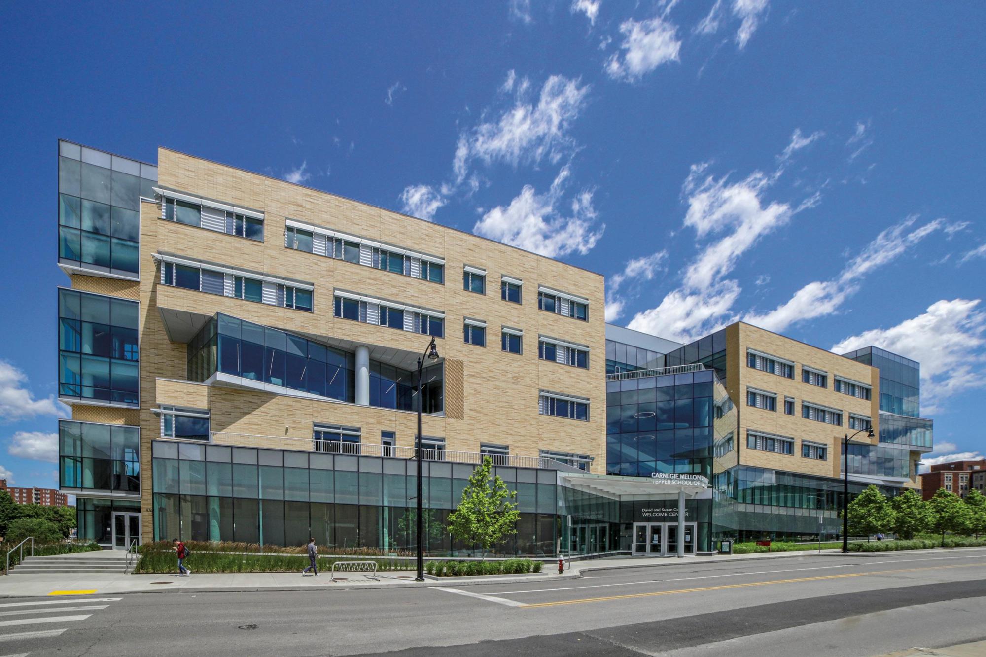 Image of the beige bricked exterior of the Tepper Quad Project