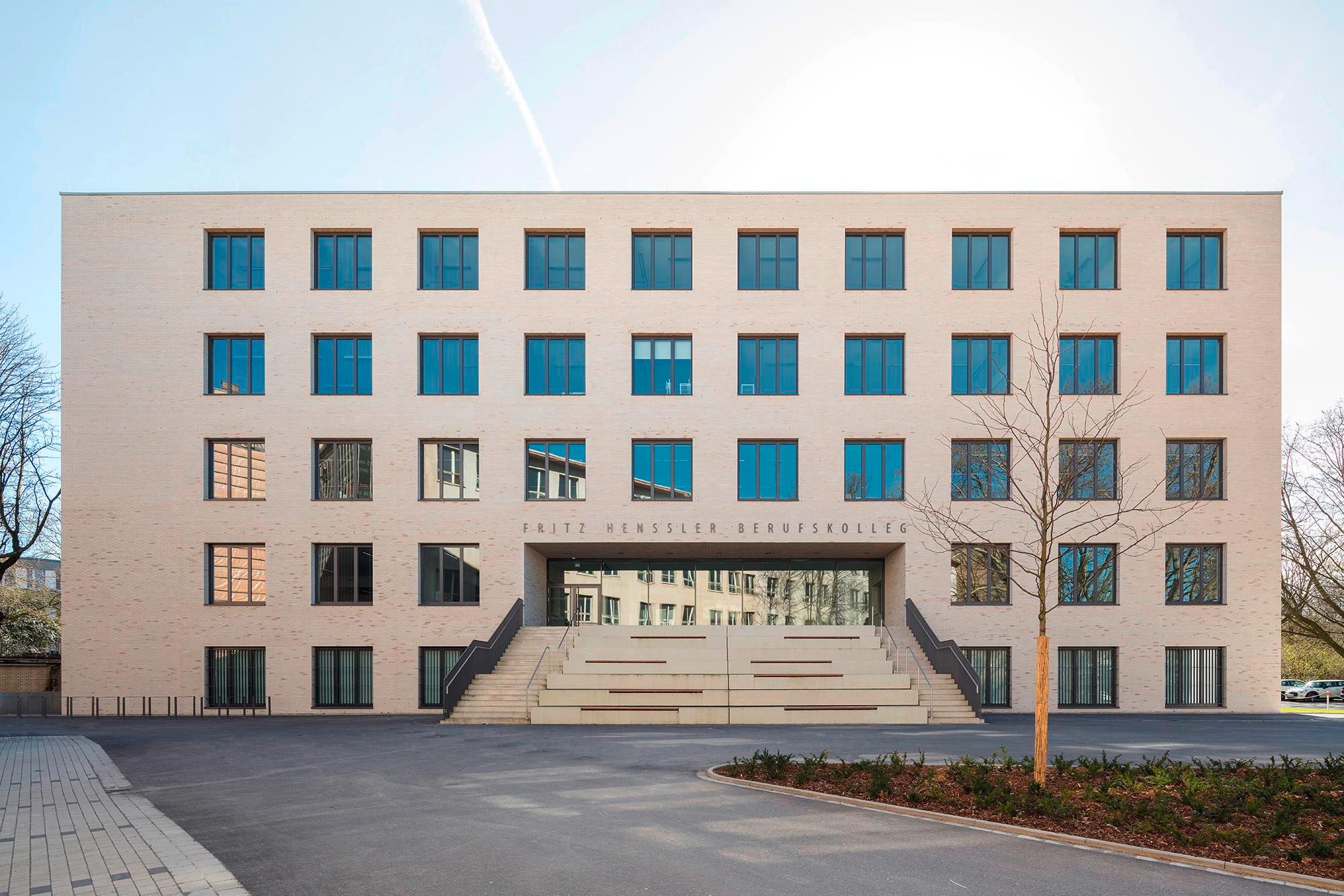 Image of the gray brick, windowed, multi-storied Fritz Henssler Vocational College