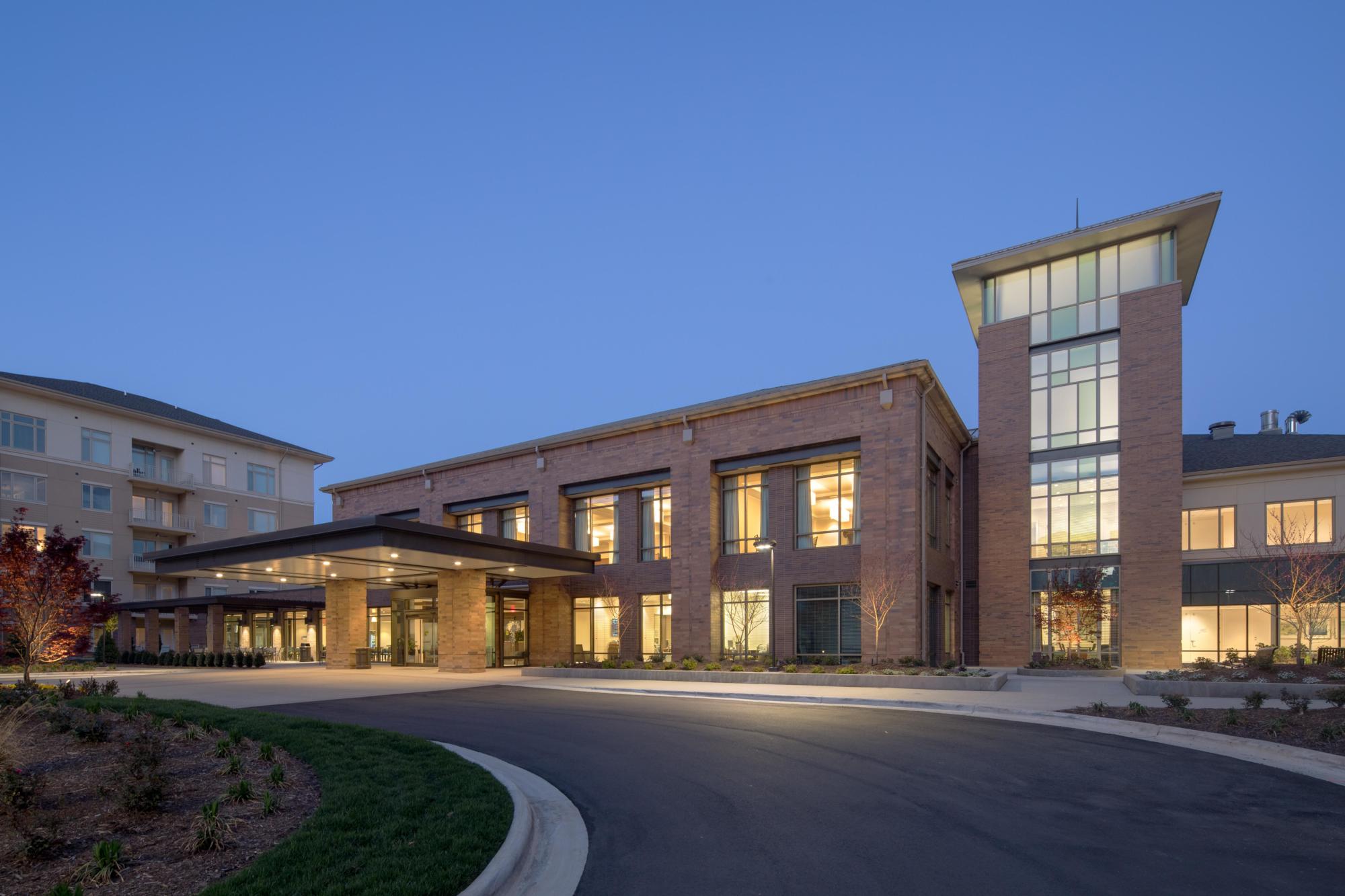 A photograph of the driveway and building at The Cardinal at North Hills