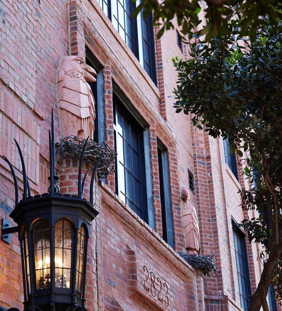 The bricked exterior of The Madelon multi-family housing complex