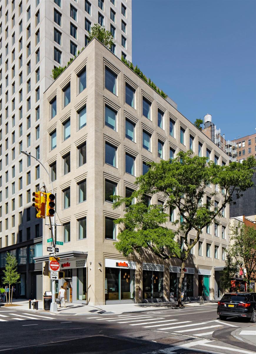 The beige bricked 116 University Place building