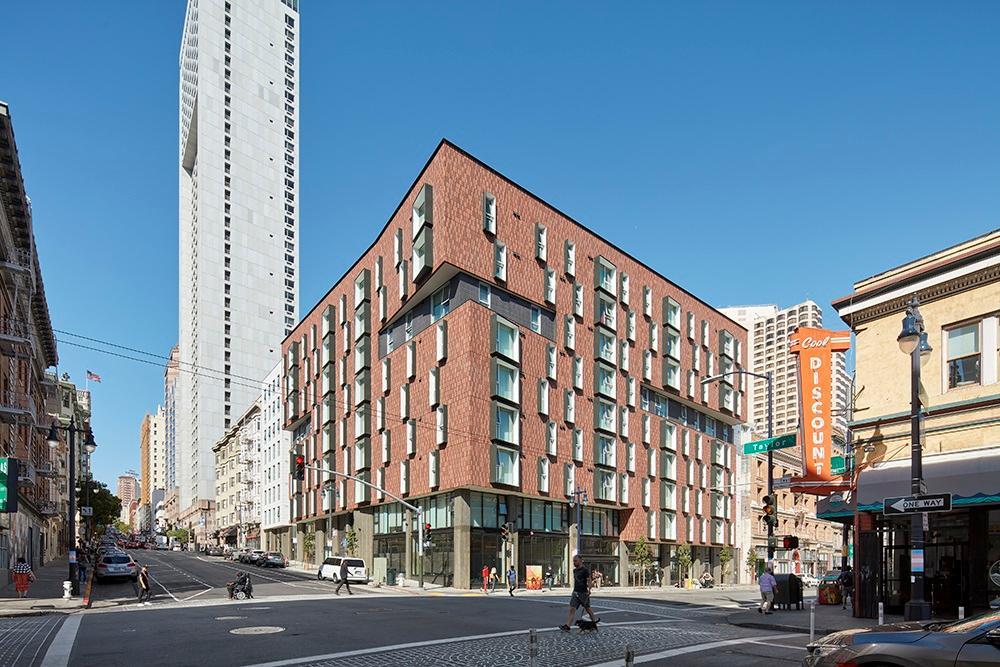 The red bricked exterior of the 222 Taylor building