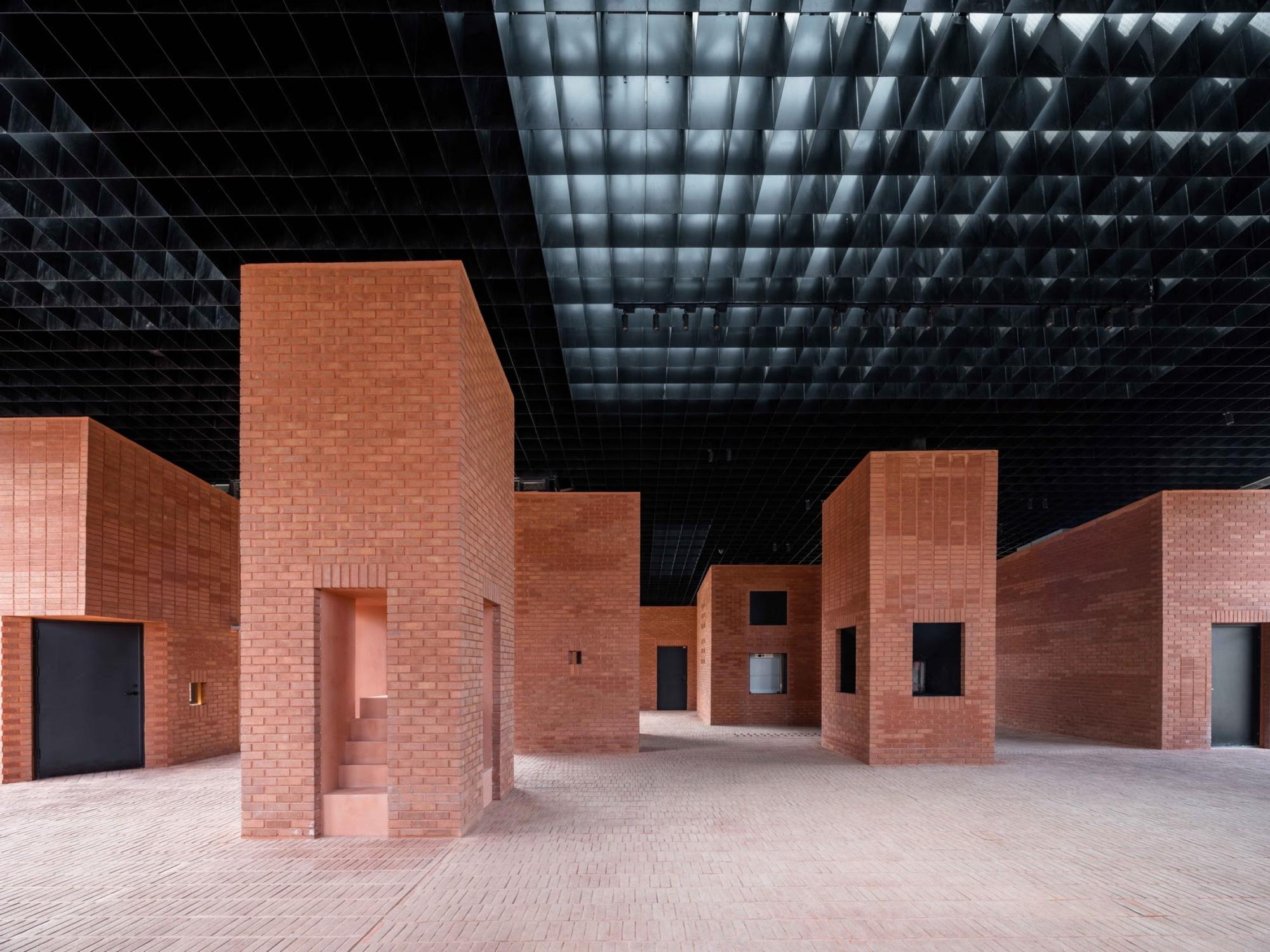 The red brick interior of the Art Center of Aranya