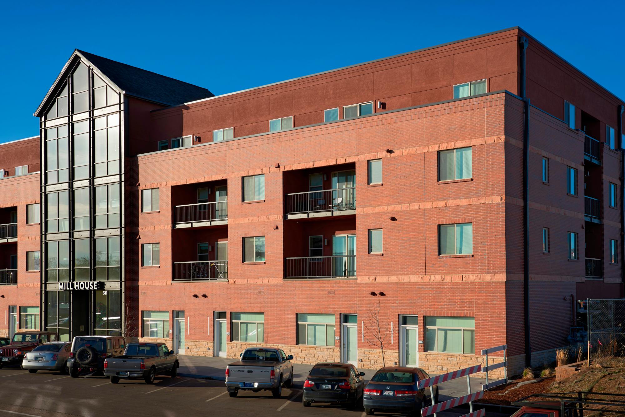 Exterior photograph of the Mill House Multi-Family Residences