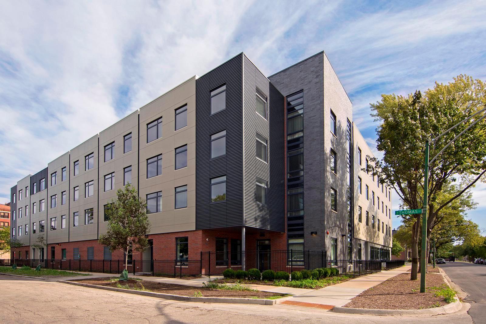 Exterior photograph of 65th Infantry Regiment Borinqueneers Veteran's Apartments