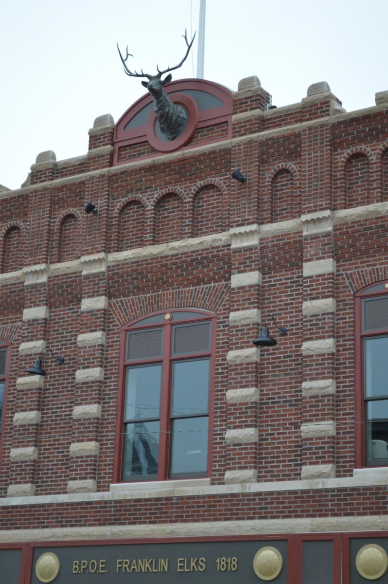 Photo of Franklin Elks Lodge Renovation with brown brick and elk sculpture at the top