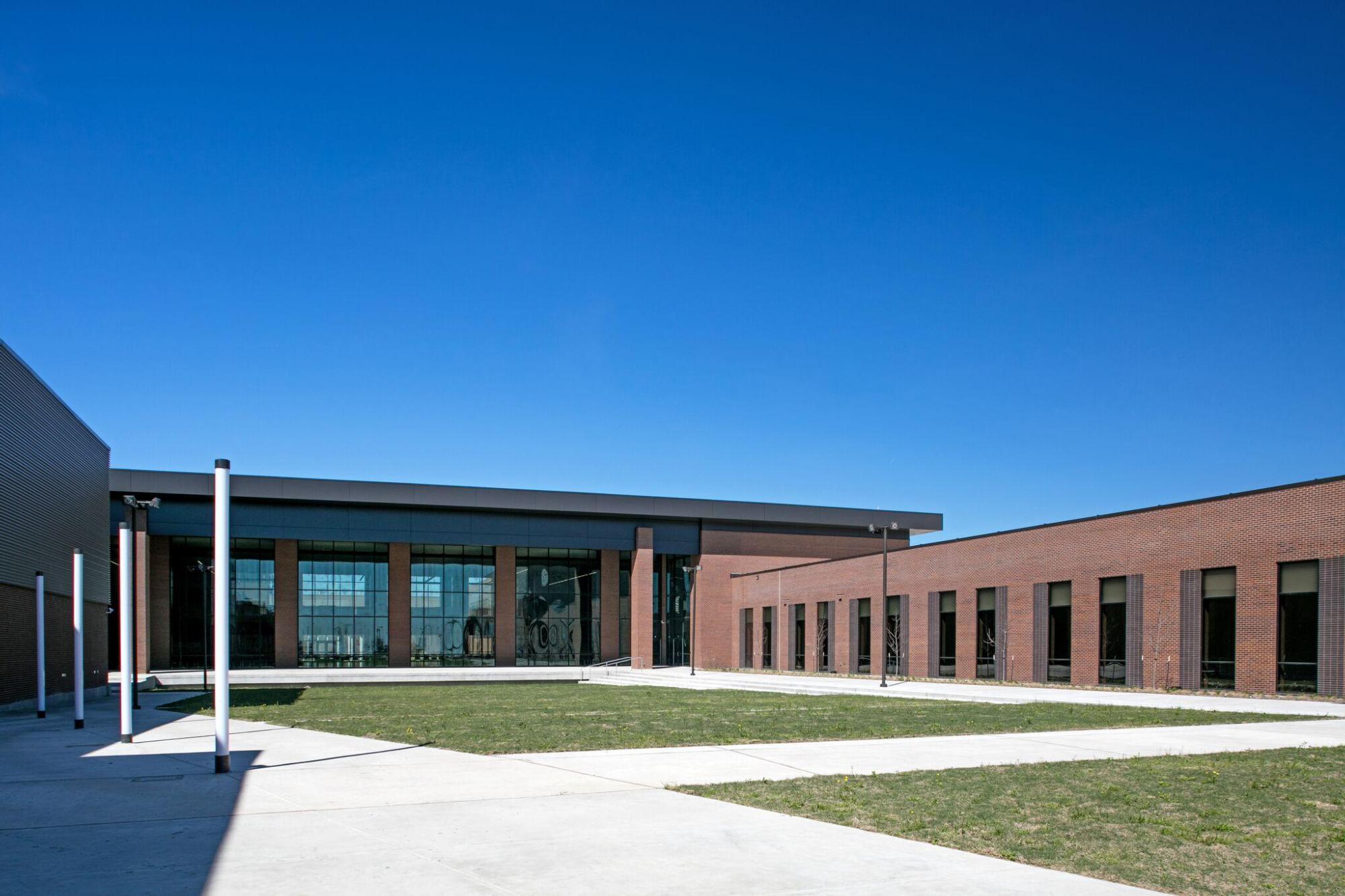 Image of the exterior of Ray Braswell High School, with brick walls