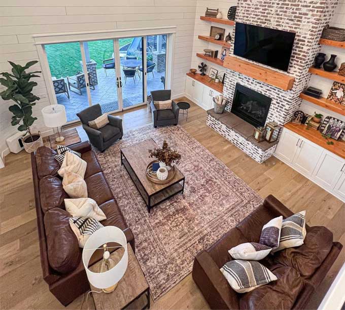 Cozy home interior with a red-brick fireplace